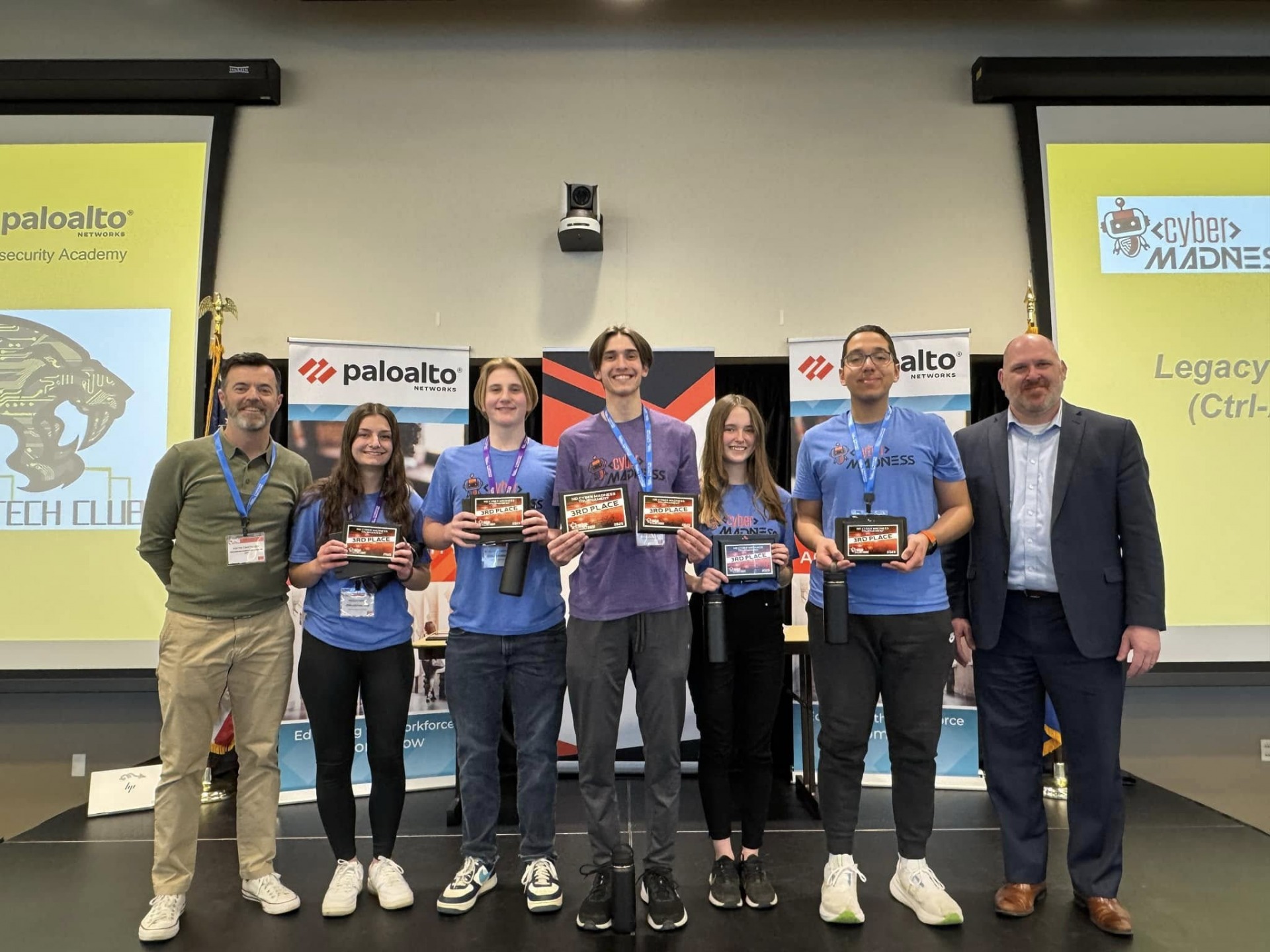 Bismarck Legacy High School team who won third place, posing for a photo with their awards