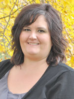 Middle aged woman wearing a black shirt.