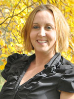 Middle aged woman wearing a black shirt.